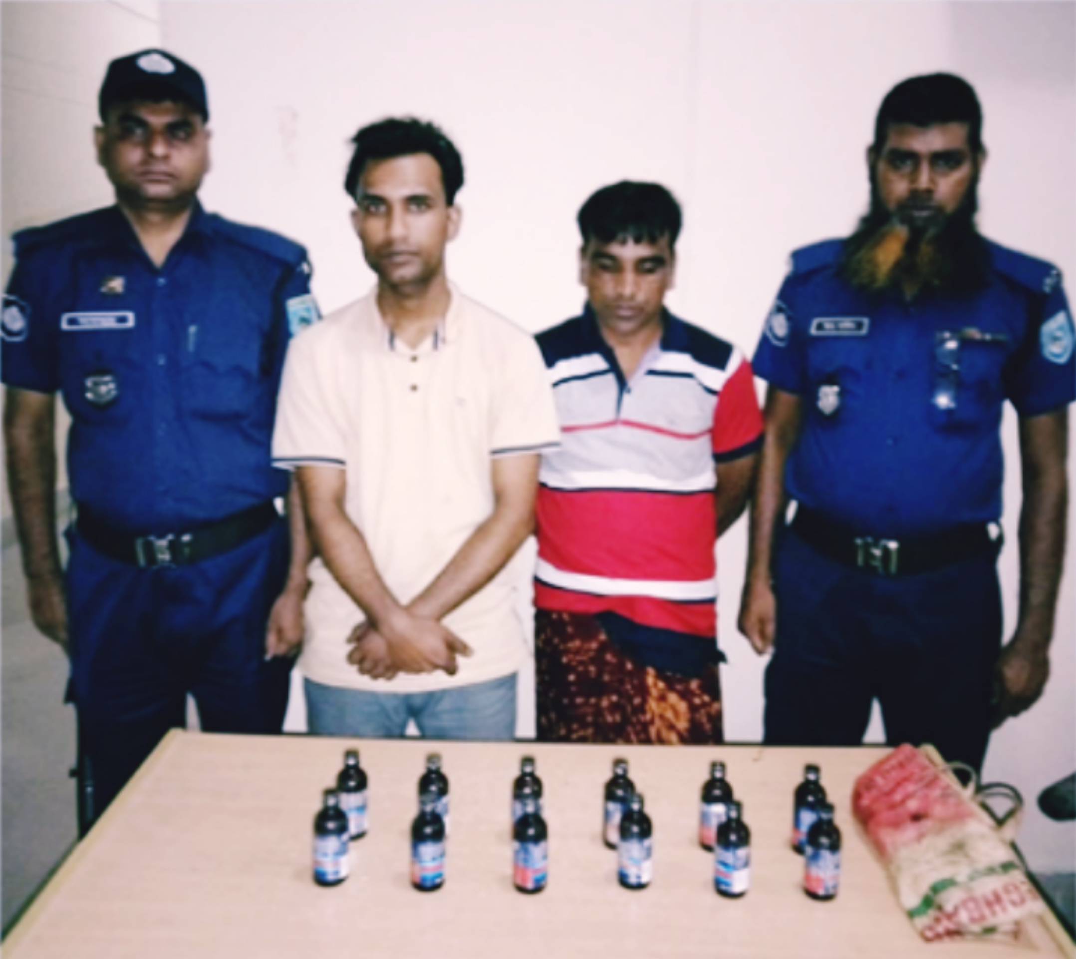 ছেলের জন্মদিনে বন্ধুদের জন্য ফেনসিডিল এনে আটক বাবা